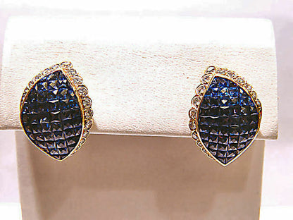 FRENCH CUT BLUE SAPPHIRES INVISIBLE SET WITH ROUND BRILLIANT DIAMOND