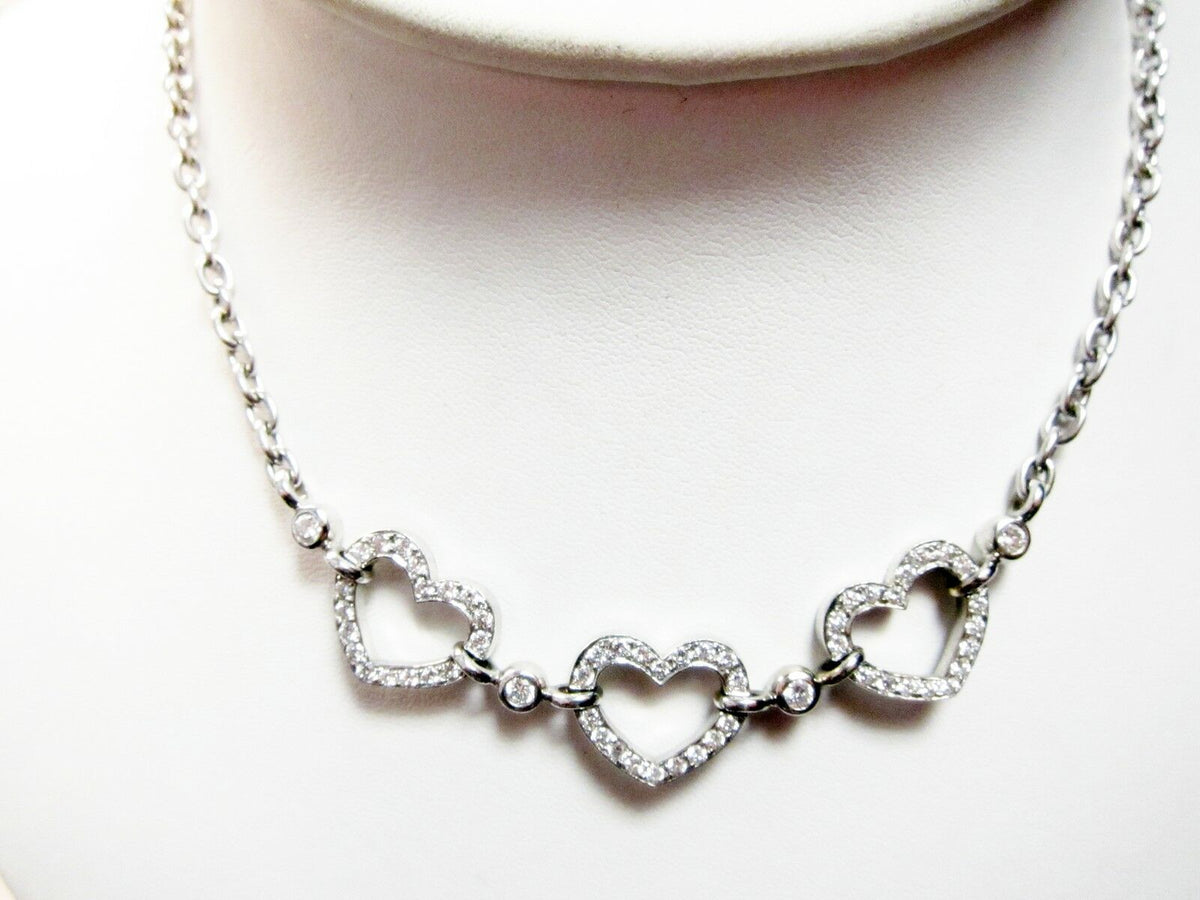 DIAMOND SET THREE HEART SHAPE PRONG BEZEL SET DIAMOND