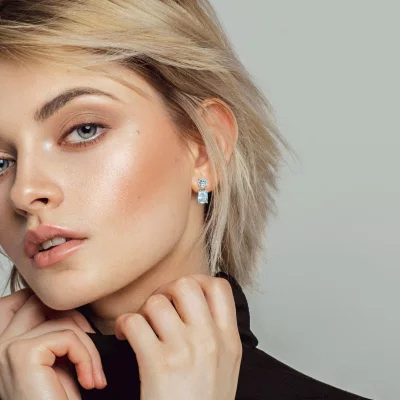 Blue Topaz Dangle Earrings in Sterling Silver