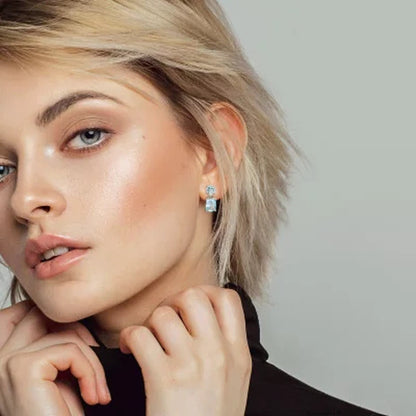 Blue Topaz Dangle Earrings in Sterling Silver