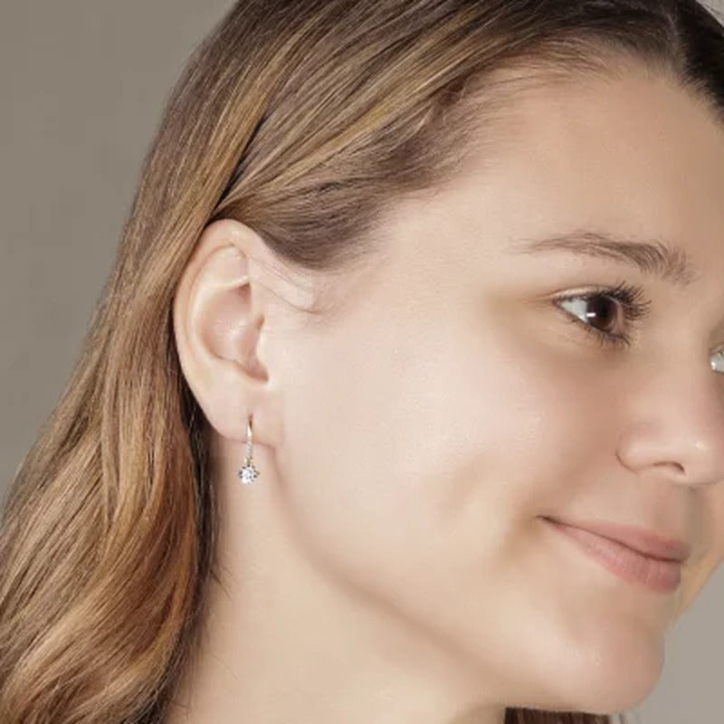 0.20 CT. T.W. Diamond Dangle Earrings in 14K Yellow Gold