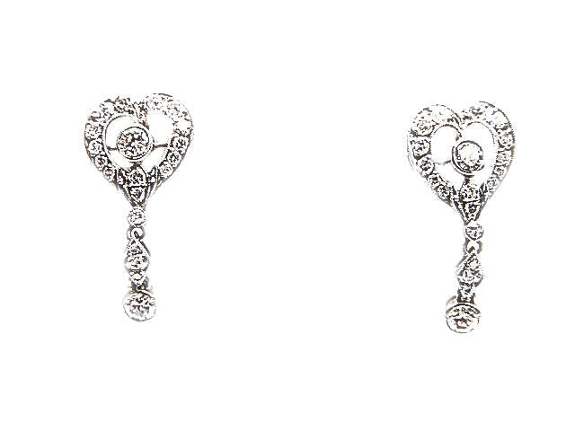 ROUND BRILLIANT CUT BEZEL AND PRONG SET DIAMOND ANTIQUE