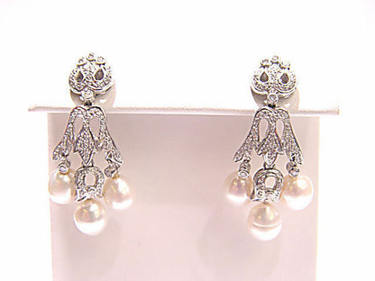 6 TOTAL FRESH WATER PEARL SET WITH ROUND BRILLIANT SHAPE