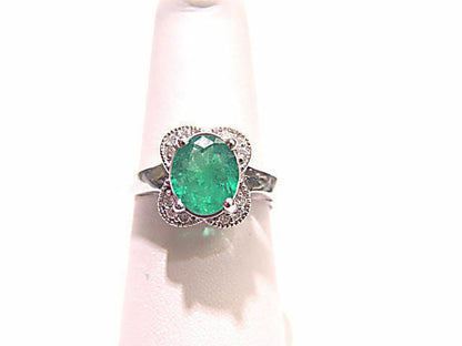 1.41 CT 1 OVAL EMERALD SET WITH ROUND BRILLIANT SHAPE DIAMOND .15 CT FLOWER RING