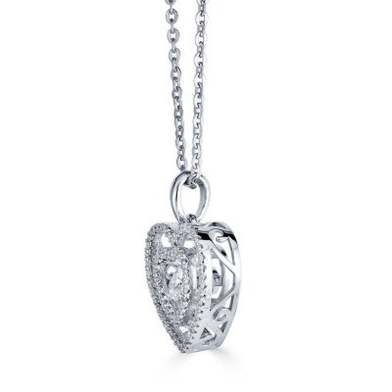 Sterling Silver Dancing Lab Created White Sapphire and 0.14 CT. T.W. Diamond Hea