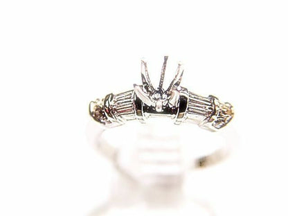 DIAMOND BAGUETTE ROUND BRILLIANT SHAPE SETTING 6 PRONG