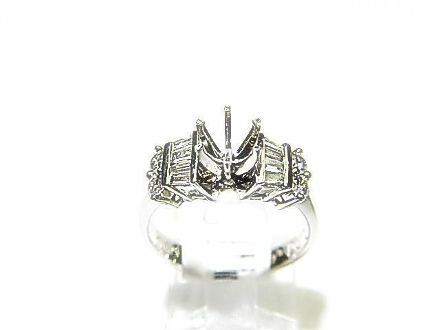 4 ROUND BRILLIANT BAGUETTE DIAMOND SETTING