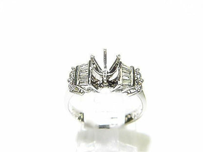 4 ROUND BRILLIANT BAGUETTE DIAMOND SETTING
