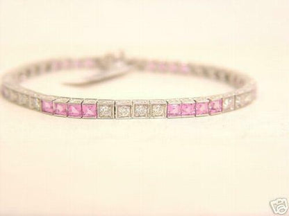 24 SQUARE CUT PINK SAPPHIRE 6.86 CTTW AND 24 ROUND BRILLIANT SHAPE