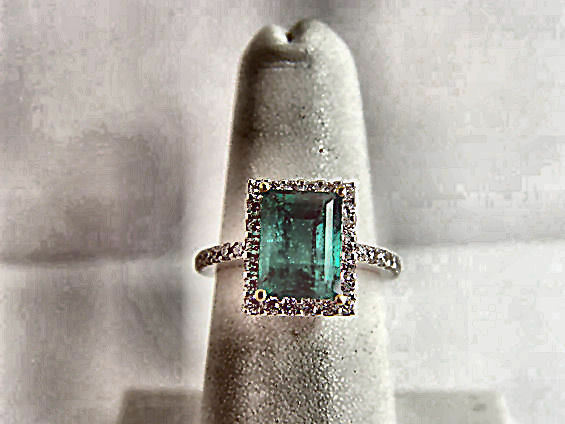 EMERALD GREEN RECTANGLE SHAPE 9.14X 6.92X 5.33MM DIAMOND