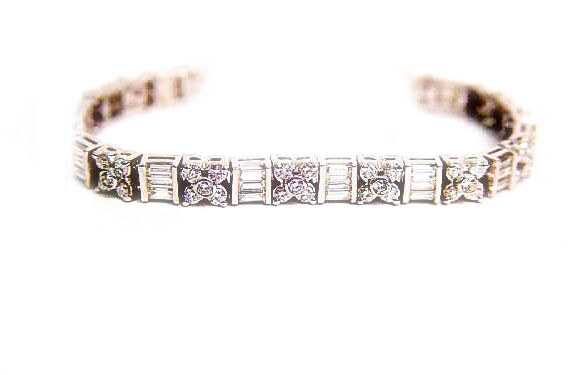 75 ROUND BRILLIANT CUT AND 45 BAGUETTE CUT DIAMOND TENNIS BRACELET