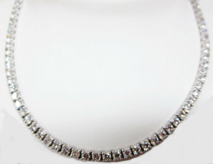 DIAMOND TENNIS NECKLACE 20 POINTERS SAME SIZE DIAMOND SET TO THE BACK