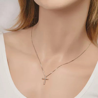 0.23 CT. T.W. Diamond Cross Pendant in 14K Gold