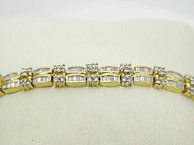 DIAMOND ROUND BRILLIANT BAGUETTE SHAPE PRONG CHANNEL SET DIAMOND