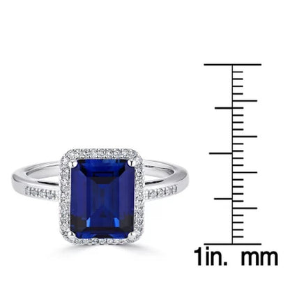 Lab Created Blue Sapphire and 0.14 CT. T.W. Diamond Ring in Sterling Silver
