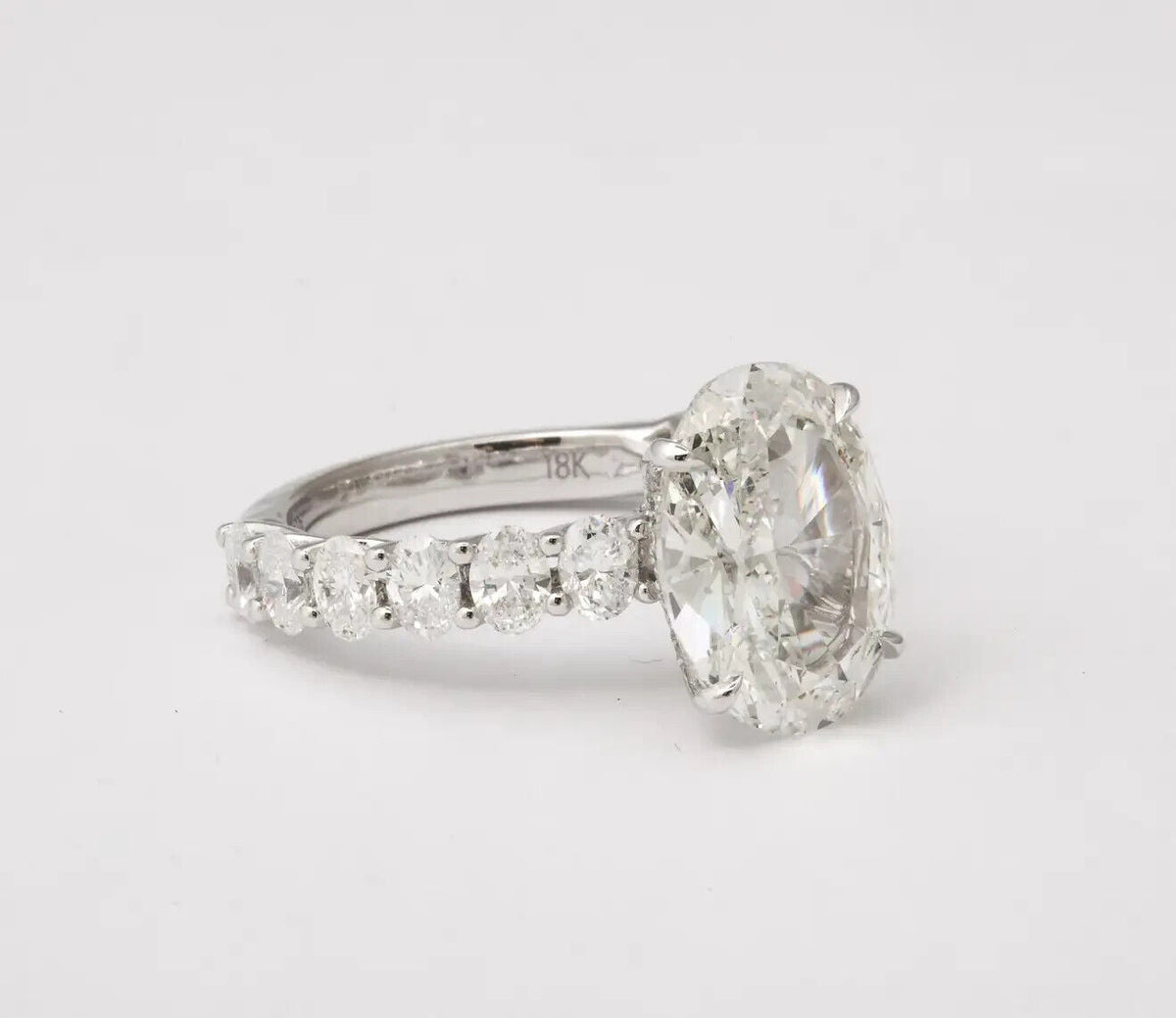 GIA certified E color SI2 4 carat Oval Diamond Engagement Ring