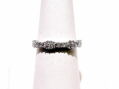DIAMONDS PRONG SET ALL THE WAY AROUND ETERNITY
