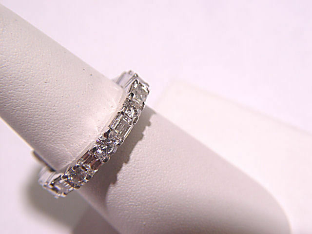 10 ROUND BRILLIANT 10 EMERALD CUT DIAMOND SET ALL THE WAY AROUND
