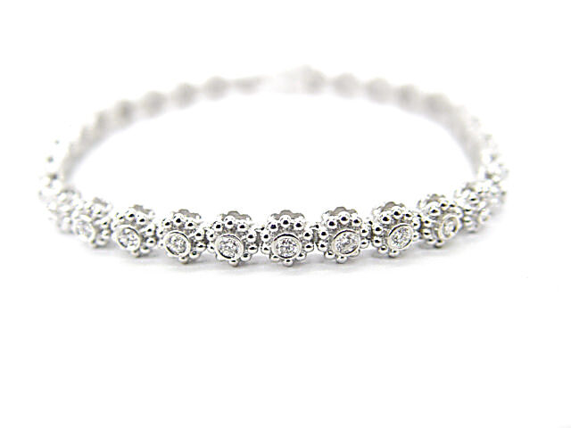DIAMOND ROUND BRILLIANT SHAPE 31 STONE SET BEZEL SET DIAMOND