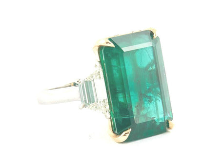 GIA certified 18.83 carat emerald set along 2.08 carat of side diamonds