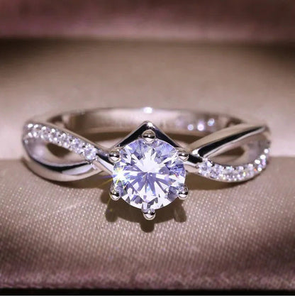 Six-Pronged Colorless Moissanite Infinity Engagement Ring in Infinity Ring Diamo