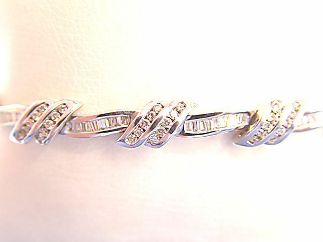 ROUND BRILLIANT CUT AND BAGUETTE CUT CHANNEL SET DIAMOND