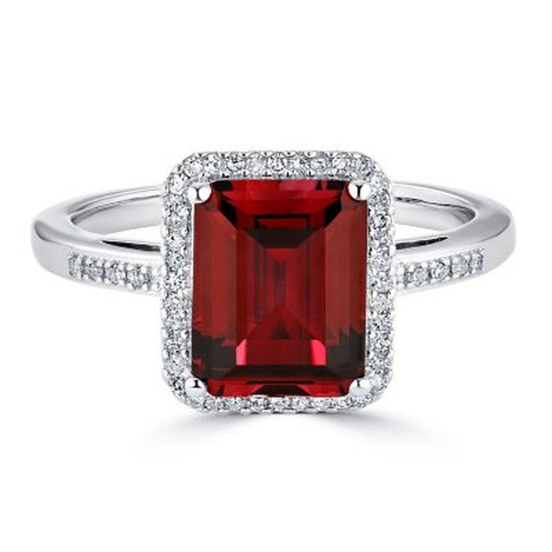 Lab Created Ruby and 0.14 CT. T.W. Diamond Ring in Sterling Silver
