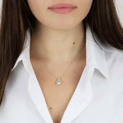 Lab Created White Sapphire with 0.11 CT. T.W. Diamond Halo Pendant in 14K Gold
