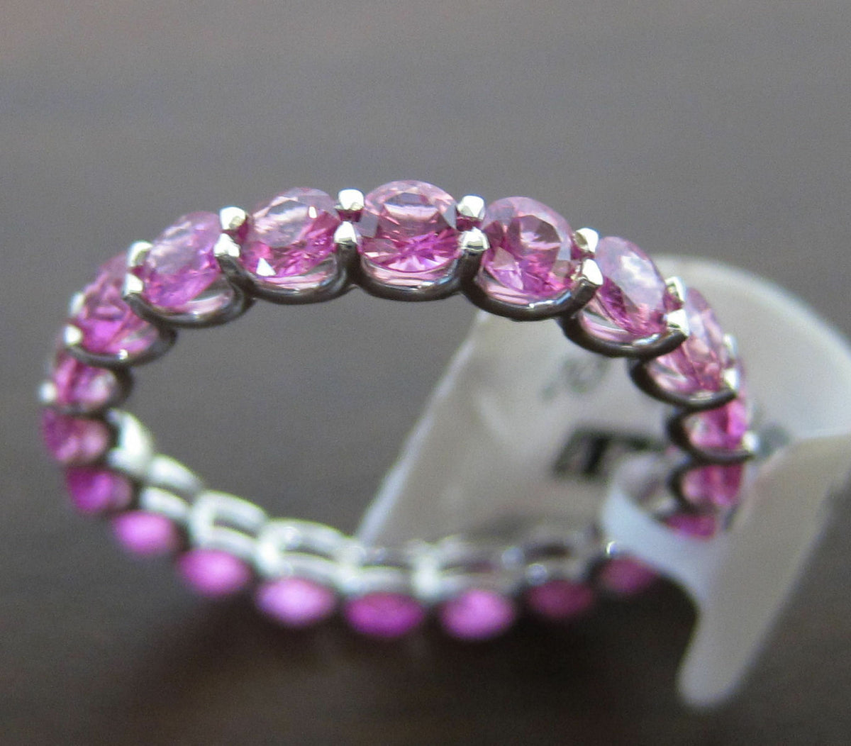 ROUND SHAPE PINK SAPPHIRE ETERNITY BAND COMMON PRONG SET