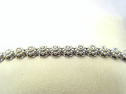 DIAMOND ROUND BRILLIANT SHAPE 31 STONE SET BEZEL SET DIAMOND