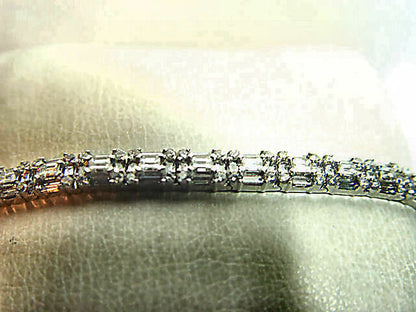 8.64 ct round brilliant baguette shape prong set G color VS1/2 clarity 18 k gold
