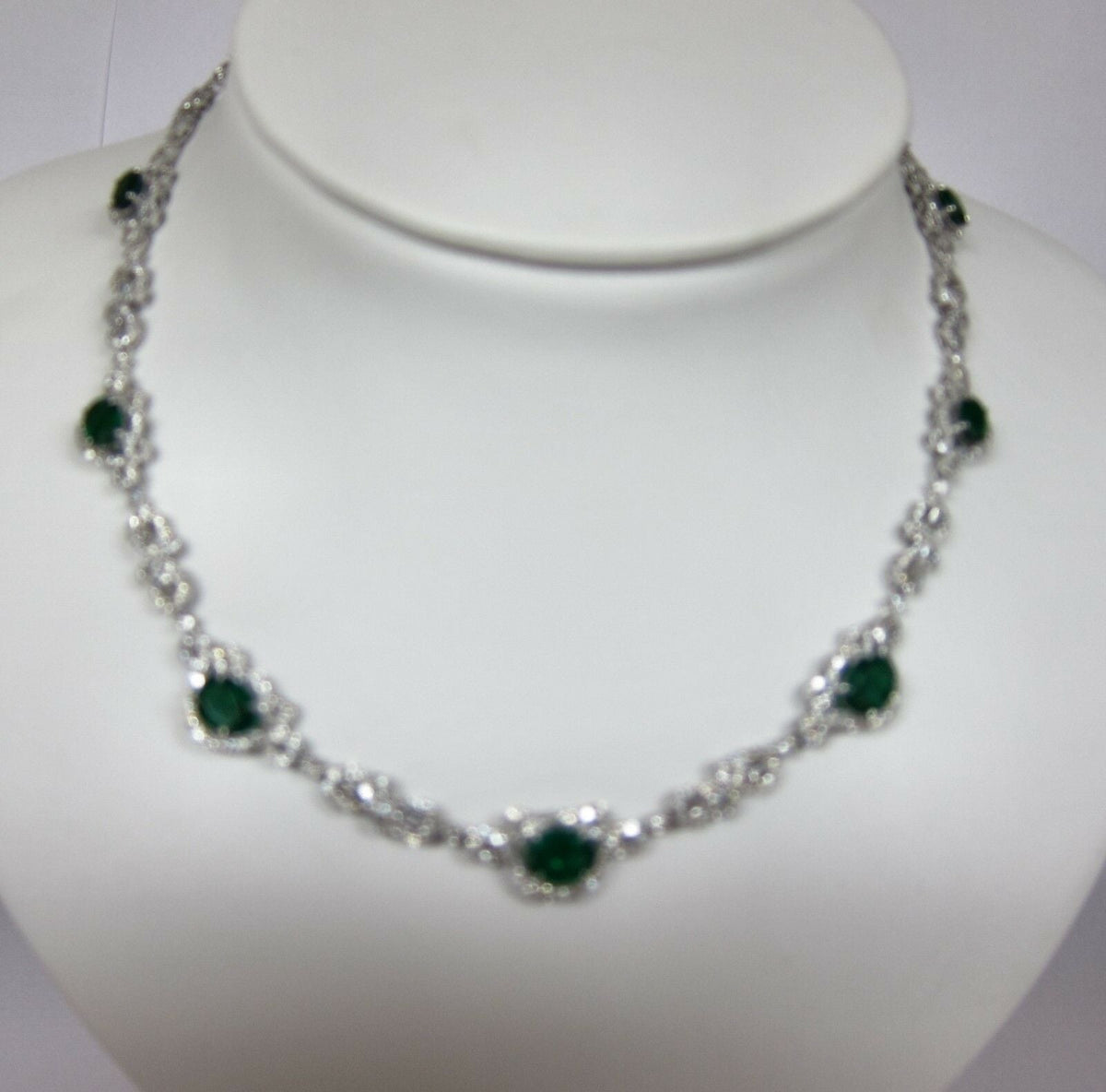 EMERALD 7 OVAL SHAPE DIAMOND ROUND BRILLIANT AND TAPERED DIAMOND