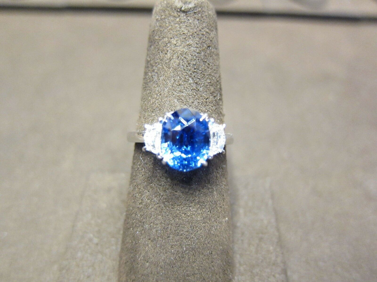 SAPPHIRE OVAL SHAPE DIAMOND HALFMOON STEP CUT SET RING