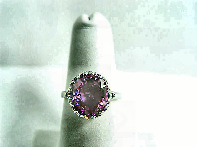 SAPPHIRE PINK OVAL SHAPE 10.86X 9.42X 4.83MM SET ROUND