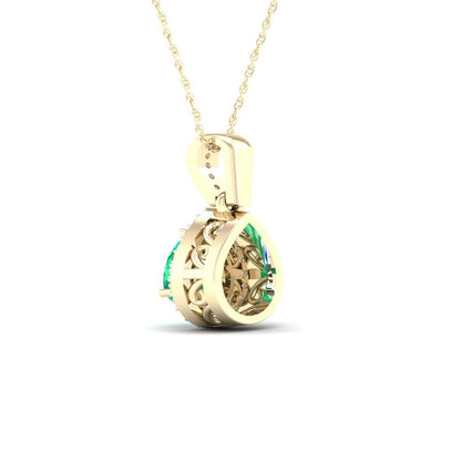 Imperial Gemstone 10K Yellow Gold Pear Cut Emerald 1/20 CT TW Diamond Halo Penda