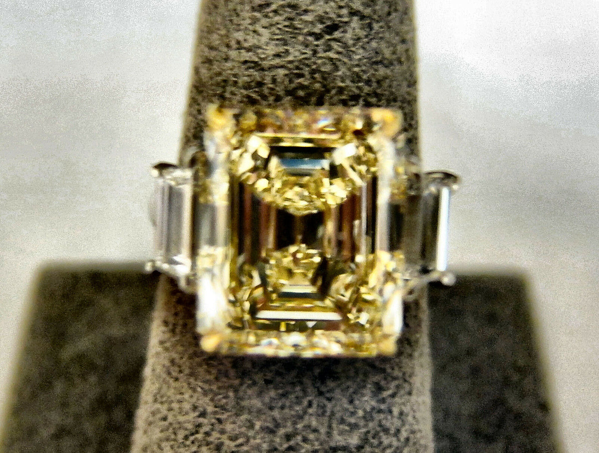 FANCY LIGHT YELLOW DIAMOND DIAMOND TWO TRAPEZOID ENGAGEMENT RING