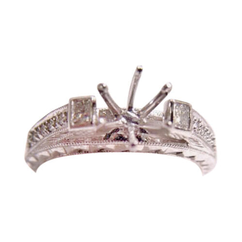 ANTIQUE STYLE SETTING ROUND BRILLIANT AND 2 PRINCESS CUT