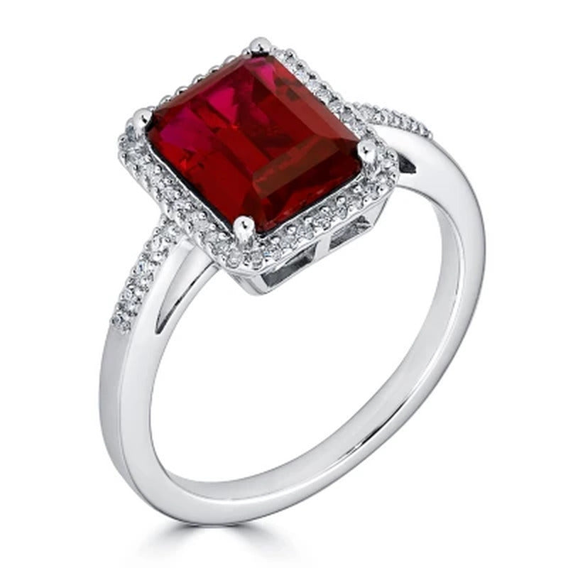 Lab Created Ruby and 0.14 CT. T.W. Diamond Ring in Sterling Silver