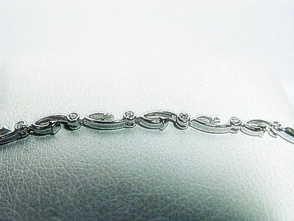 DIAMOND ROUND BR SHAPE BEZEL SET BRACELET 17 STONE