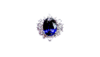 OVAL BLUE SAPPHIRE SET WITH ROUND BRILLIANT MARQUISE