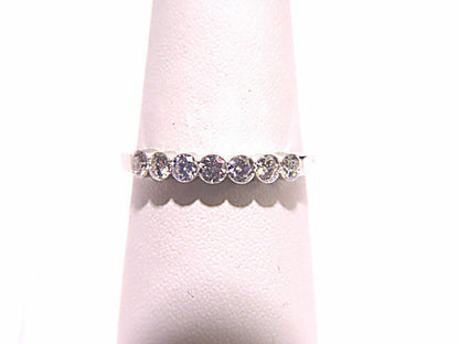 7 STONE ROUND BRILLIANT CUT INVISIBLE SET NO PRONGS