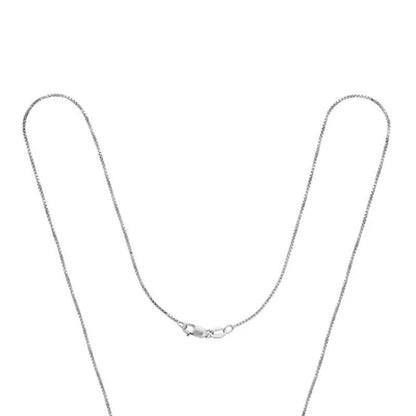 Dancing Lab Created Emerald and 0.12 CT. T.W. Diamond Infinity Pendant in Sterli