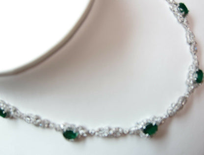 EMERALD 7 OVAL SHAPE DIAMOND ROUND BRILLIANT AND TAPERED DIAMOND