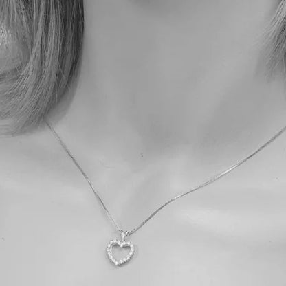 1/4 CT. T.W. Diamond Heart Pendant in 14K Gold
