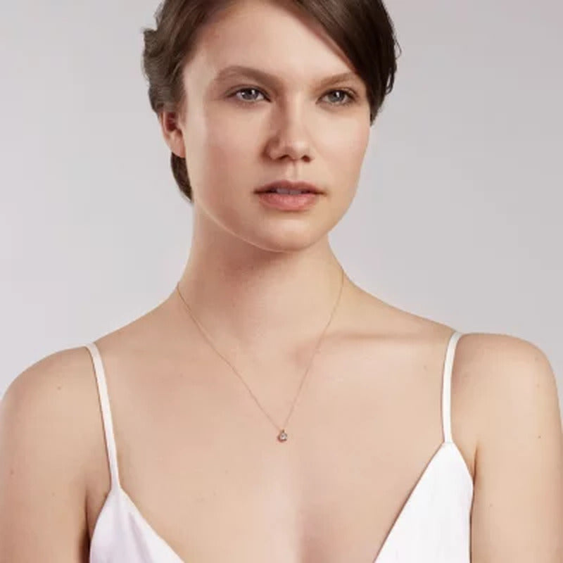0.04 CT. T.W. round Diamond Pendant in 14K Two-Tone Gold