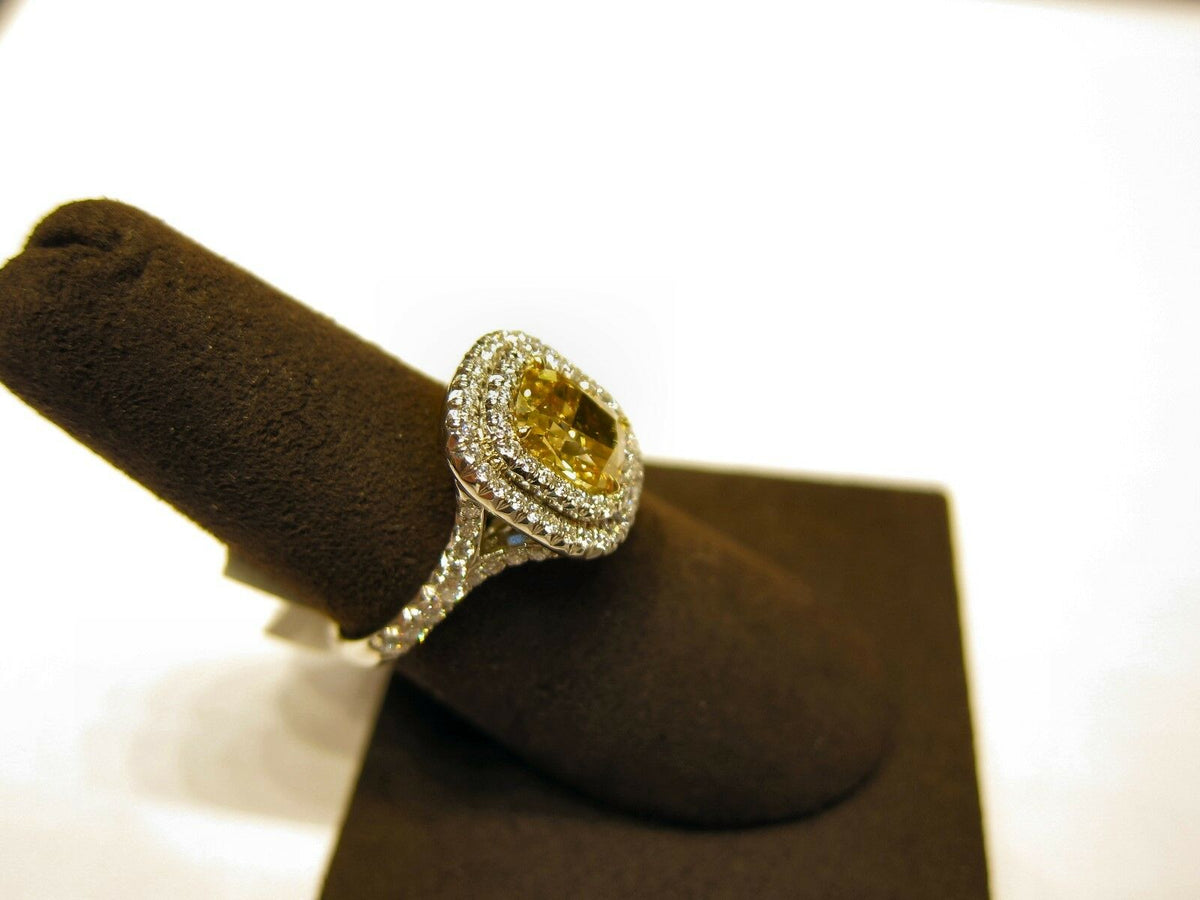 GIA FANCY VIVID YELLOW CUSHION SHAPE DIAMOND SET WHITE ROUND ENGAGEMENT RING
