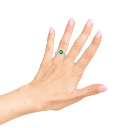 Three Stone Oval Emerald Ring with 0.20CT. T.W. Diamond Set in 14K Gold
