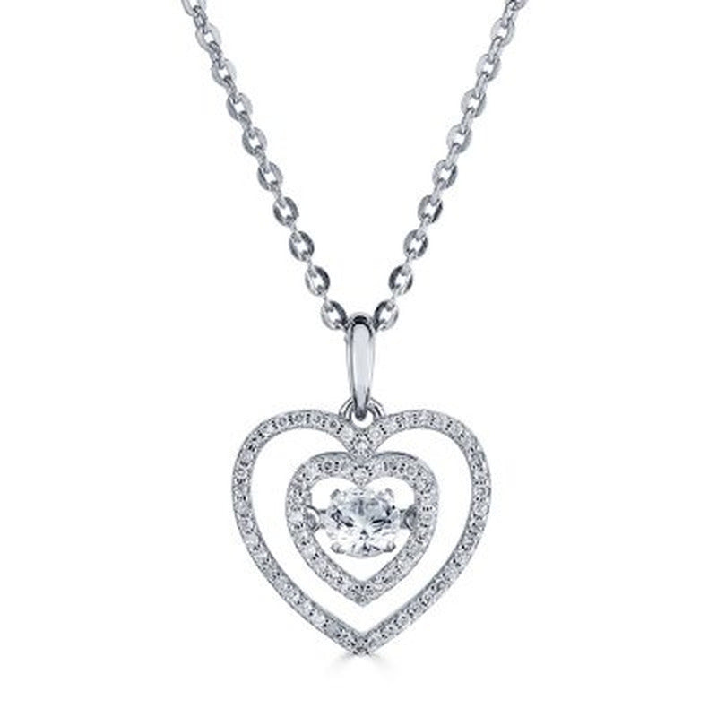 Sterling Dancing Lab Created White Sapphire and 0.14 CT. T.W. Diamond Heart Pend