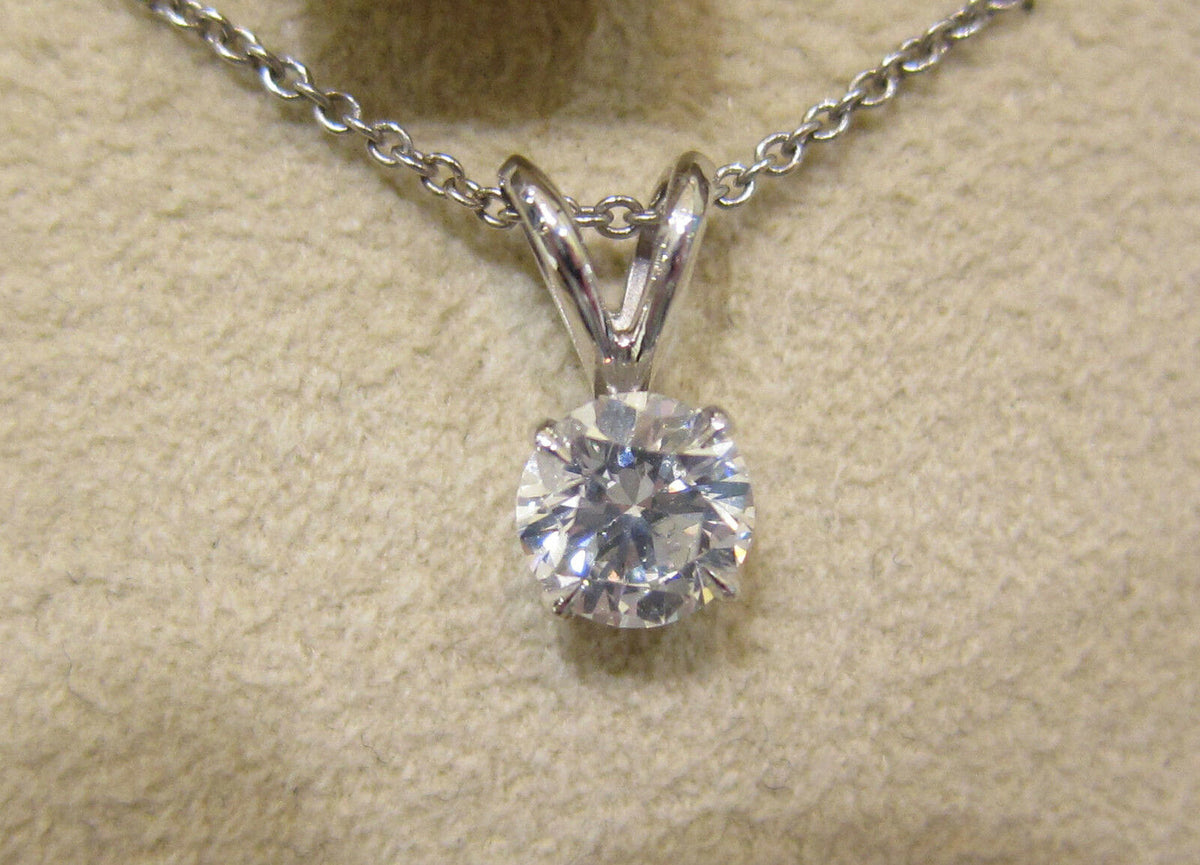 DIAMOND ROUND BRILLIANT SHAPE SOLITAIRE WITH BALE DIAMOND PENDANT SOLITAIRE