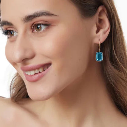 Emerald Sky Blue Topaz Dangle Earrings in 14K Yellow Gold